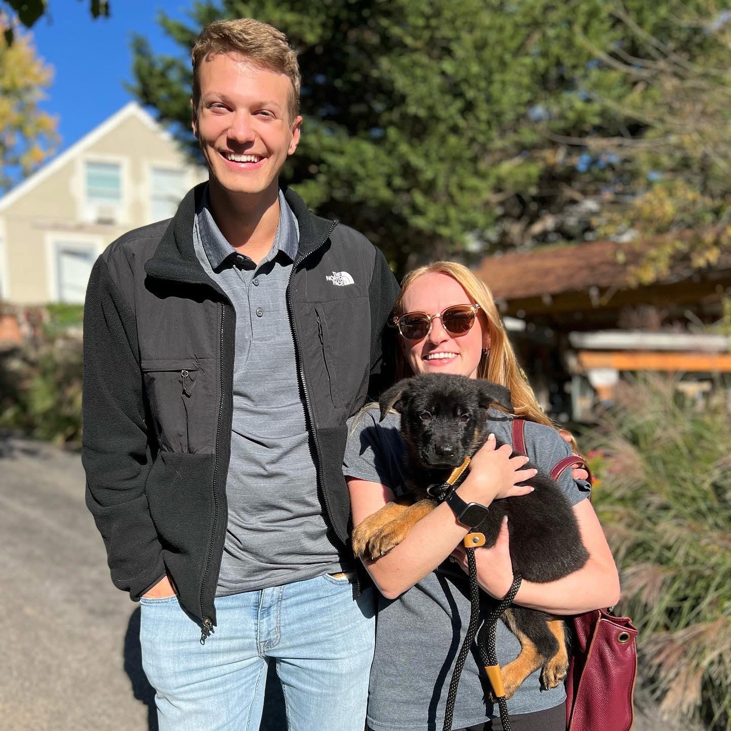 Family with their adult German Shepherd